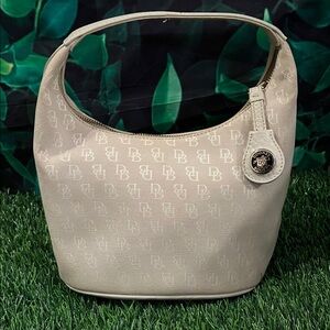 Dooney & Bourke Cream Monogram mini bucket